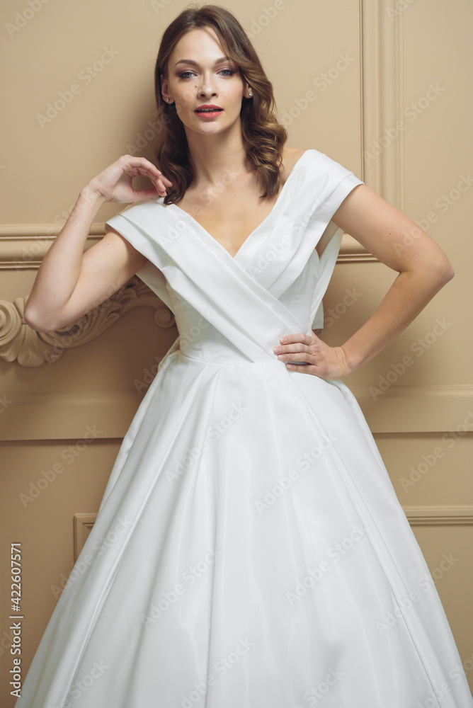 Beautiful bridesmaid dress earrings. Beautiful bride with stylish makeup and hairstyle. Beautiful bridesmaid dress earrings. Beautiful bride with stylish makeup and hairstyle.