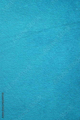Turquoise suede material close-up. Textiles for furniture upholstery. The texture of the fabric.