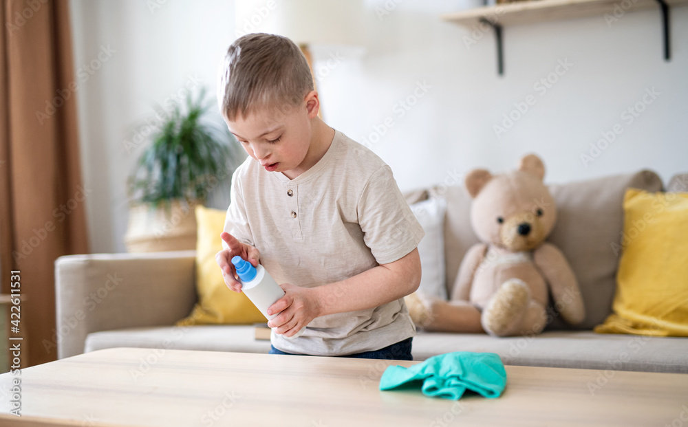 Down syndrome child cleaning at home, help with housework. Down syndrome child cleaning at home, help with housework.