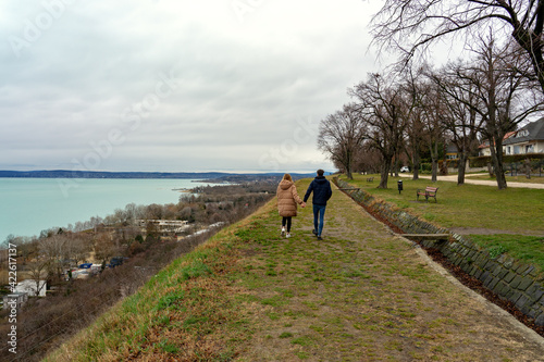 view over lake Balaton from Balatonakarattya with a young couple photo