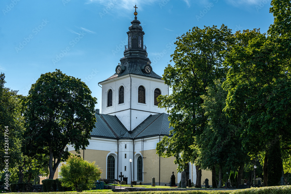 Beautiful church surrounded by lush green trees Beautiful church surrounded by lush green trees
