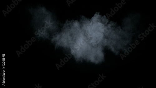 Misty chalk clouds blowing into the center. Isolated white smoke and fog wisp on black background. Studio concept and VFX plate shot for scene overlay cut out template and creative enhancement.