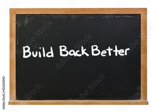 Build back better written in white chalk on a black chalkboard isolated on white