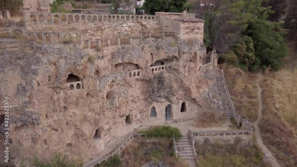 Aerial drone Landscape in Civica, a monastery cave construction in stone. An historical village, tourism destination for mystery lovers in Guadalajara, Castilla-La Mancha