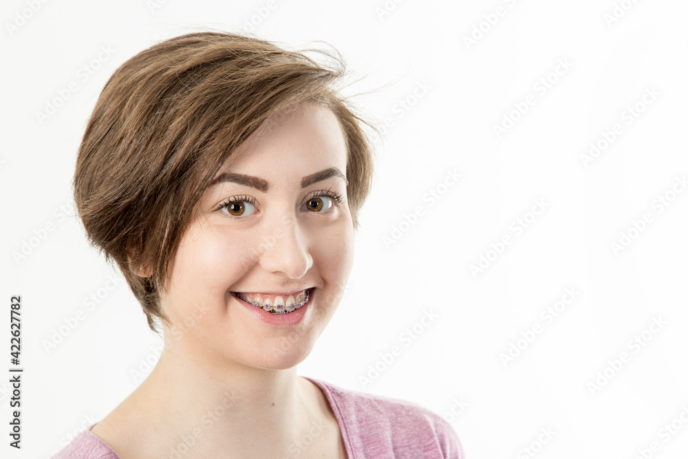 pretty dark haired teenage girl with braces smiling pretty dark haired teenage girl with braces smiling