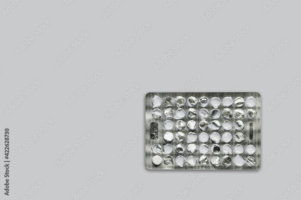 Empty pill packaging on a light background Empty pill packaging on a light background