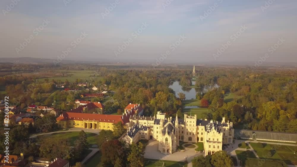 Aerial view of town Lednice and castle yard with green gardens in Moravia, Czech Republic. UNESCO World Heritage Site. Aerial view of town Lednice and castle yard with green gardens in Moravia, Czech Republic. UNESCO World Heritage Site.