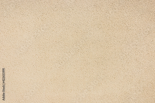 Light beige color plaster surface wall stucco texture background © Andrey