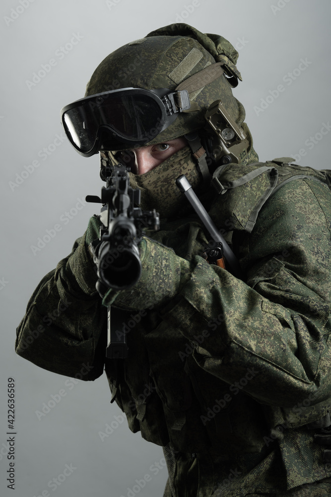 Male in russian infantry protect uniform. Isolated on grey background. Male in russian infantry protect uniform. Isolated on grey background.