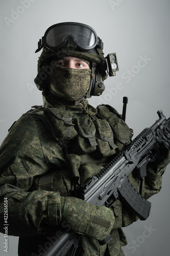 Male in russian infantry protect uniform. Isolated on grey background.