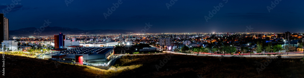 Night panorama of the city of León, Guanajuato, Mexico. Urban concept.
