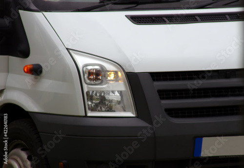 big white bus close up. car headlight © ovidiu