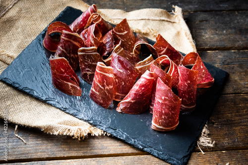 Typical dried spanish meat, cecina, spanish tapa photo