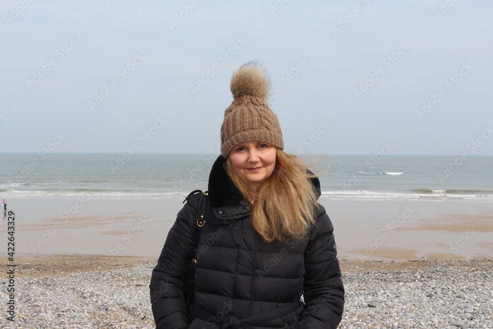 Cromer, Nortfolk, young lady looking at the camera, seaside in the background