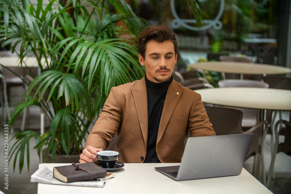 businessman sitting at the table businessman sitting at the table
