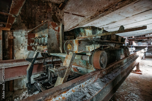 Old rusty trolley in abandoned factory