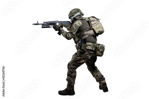 Male soldier in masking camo suit. Shot in studio. Isolated with clipping path on white background. © maximapryatin