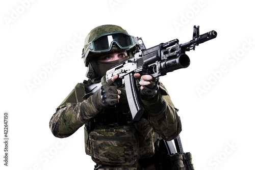 Male soldier in masking camo suit. Shot in studio. Isolated with clipping path on white background.