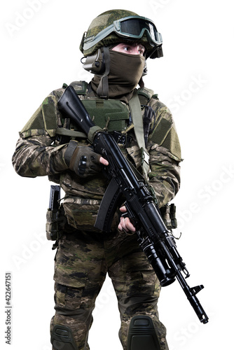 Male soldier in masking camo suit. Shot in studio. Isolated with clipping path on white background.