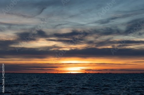Dramatic sunset sky over the sea © Daniela