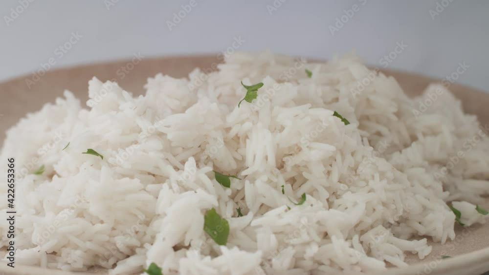 Pouring Mushroom on Rice with Wild Mushrooms