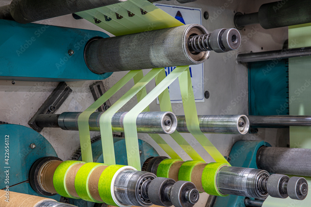 Production of duct tape.Packing tape manufacturing. Strapping Machine