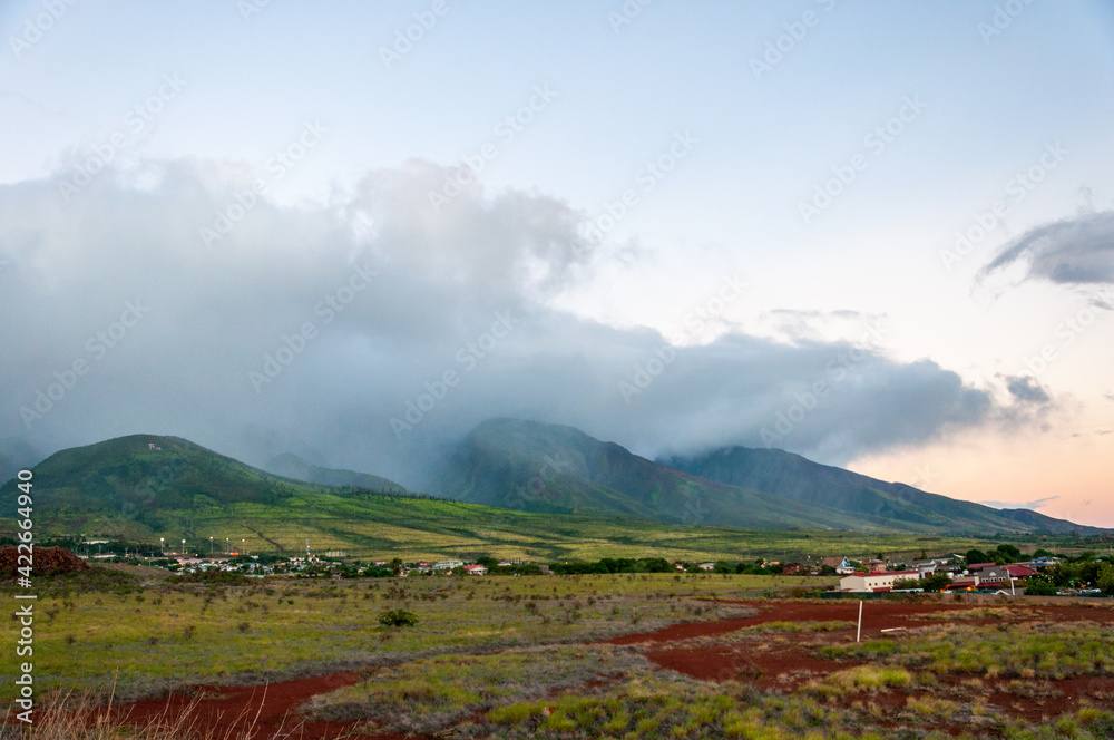 Fog and clouds rolling over Pu'u Kukui mountain, Maui, Hawaii