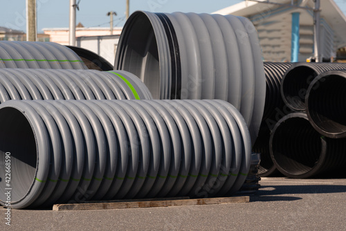 large diameter polypropylene pipes for water supply and sewerage during road construction  copy space  technology