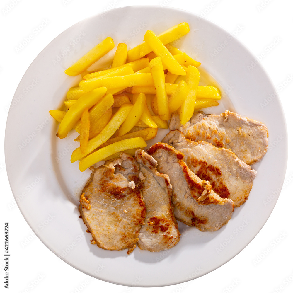 Fried pork with potatoes on a ceramic plate cooked in a restaurant. Isolated over white background
