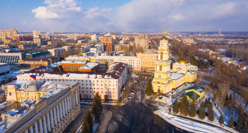 Top view of the Christ-Nativity Cathedral in the city center and residential buildings in winter in Lipetsk, Russia