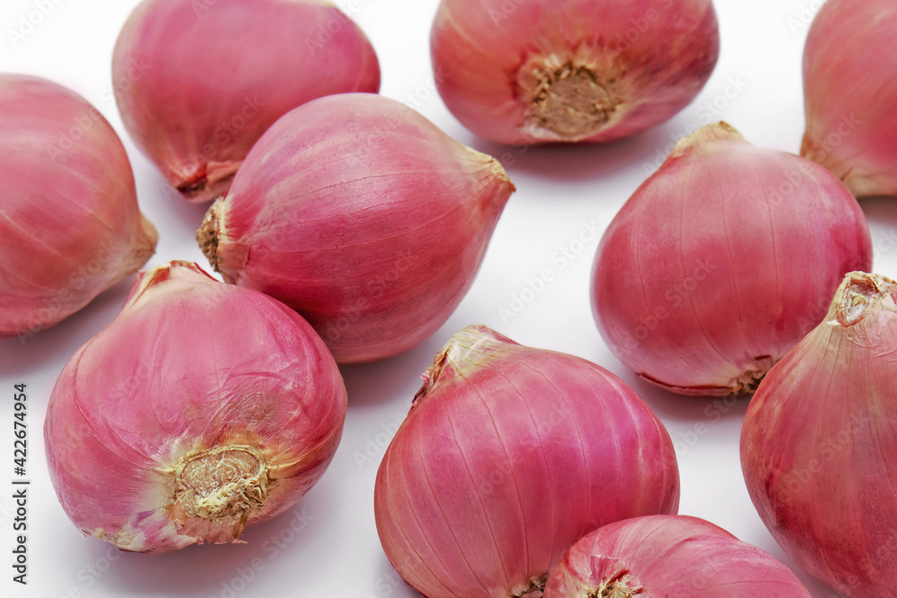 Close-up Group of Red Onions on White Background Close-up Group of Red Onions on White Background