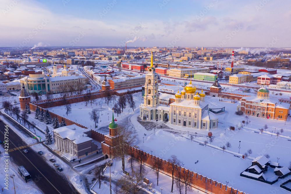Scenic view from drone of snow covered Tula Kremlin and Holy Assumption Cathedral on background with cityscape, Russia