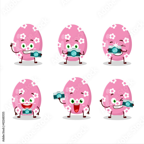 Photographer profession emoticon with pink easter egg cartoon character