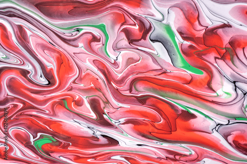 Abstract fluid art background red and white colors. Liquid marble. Acrylic painting on canvas with lines and gradient.