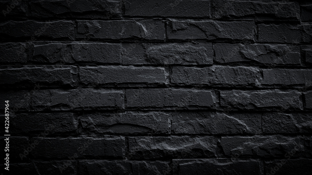 Black brick wall for background. Pattern of brickwork wallpaper and Construction building.