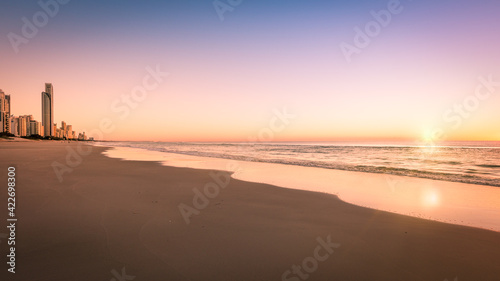 Fototapeta Naklejka Na Ścianę i Meble -  Sunrise, Surfers Paradise Beach. This popular beach is on the Gold Coast, Queensland, Australia.