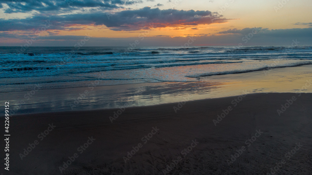 Sun and beach, sunrise on the beach of Gandia