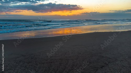 Sun and beach  sunrise on the beach of Gandia