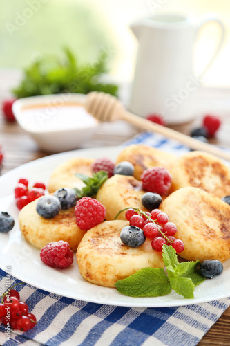 Sweet cheese pancakes with berries