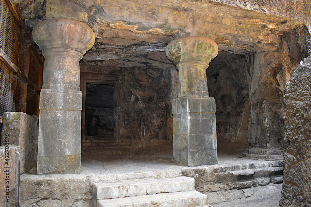 Gigantic pillars of Cave No. 1, Elephanta Cave, entrance towards Shiva Linga at Elephanta Island or Gharapuri, Mumbai, Maharashtra, India Gigantic pillars of Cave No. 1, Elephanta Cave, entrance towards Shiva Linga at Elephanta Island or Gharapuri, Mumbai, Maharashtra, India