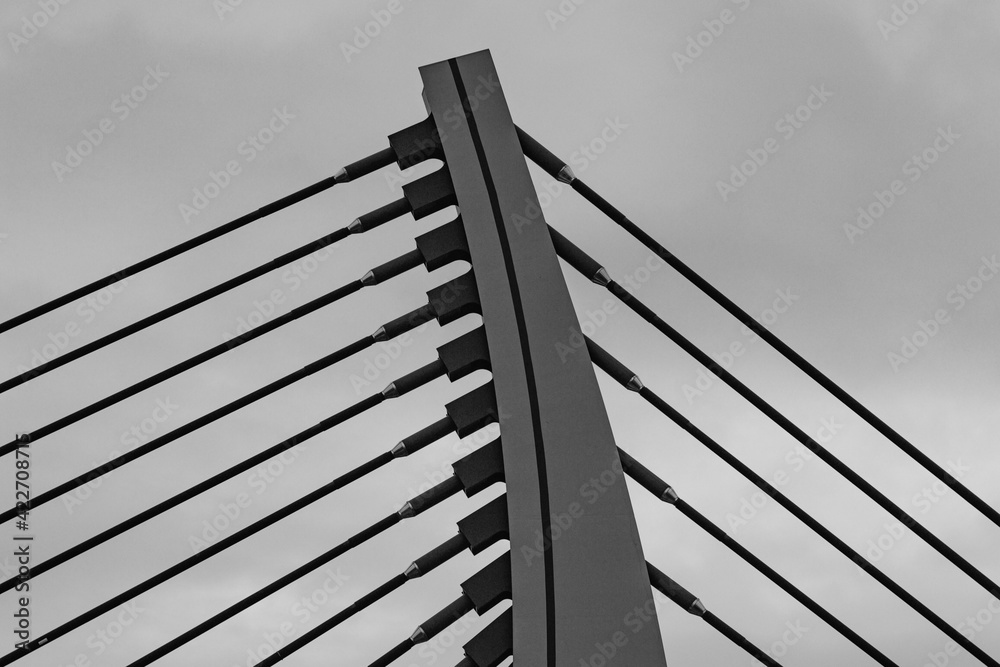 Fototapeta premium view from below on the part of the bridge with the sky in background