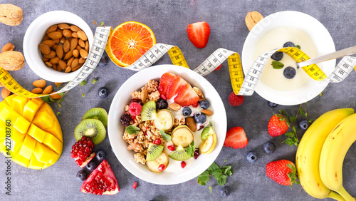 diet food concept- granola  yogurt and fruit with meter