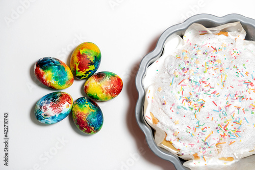 Beautiful bright colorful multi-colored cupcake and Easter eggs.