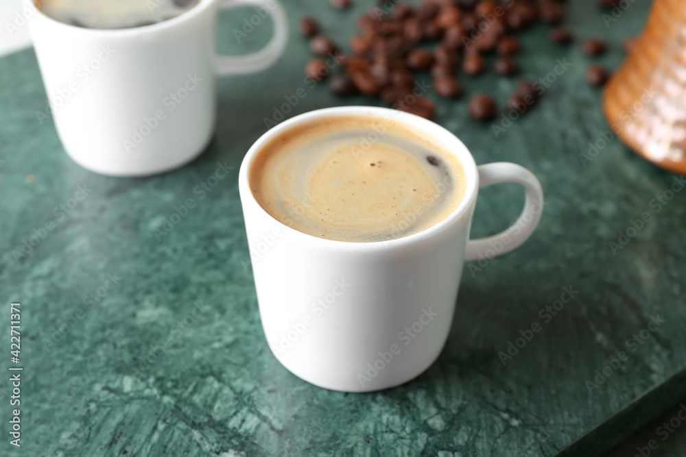 Obraz premium Cup of tasty hot coffee, closeup
