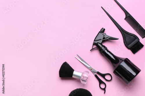 Fototapeta Naklejka Na Ścianę i Meble -  Set of hairdresser's tools on color background