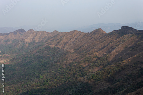 Suvela Machi a long strip of fortified walls and hill view of Rajgad fort, Pune, Maharashtra, India. © RealityImages