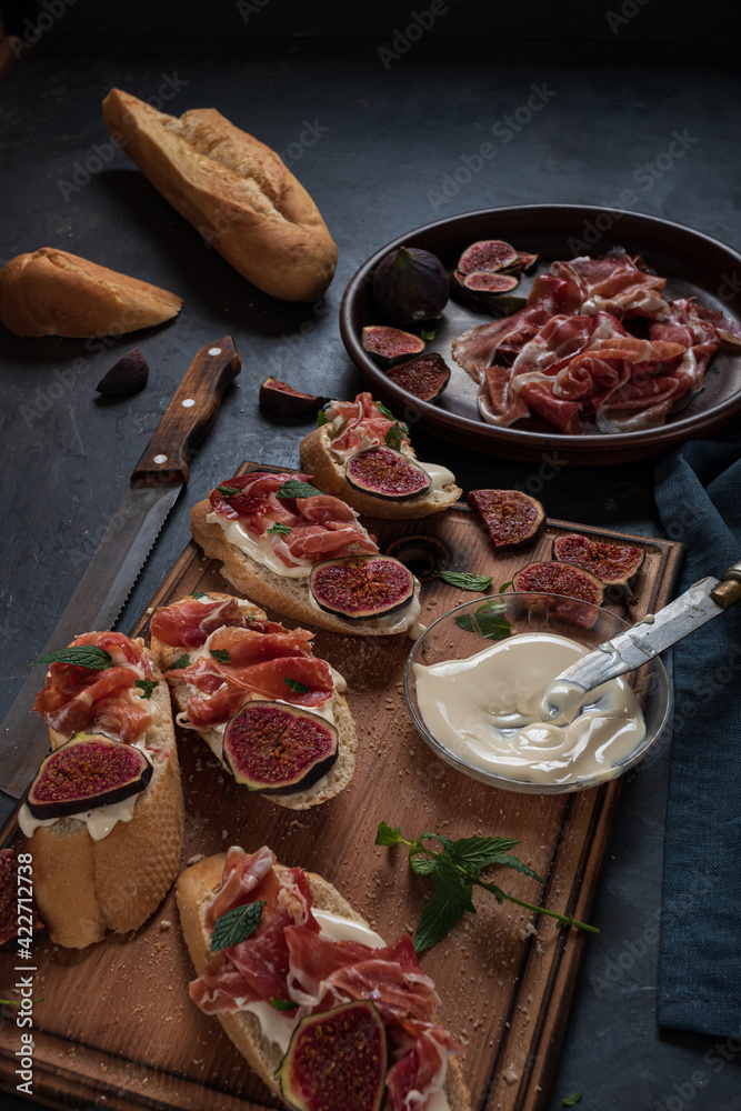 Tapas with ham and cream cheese.