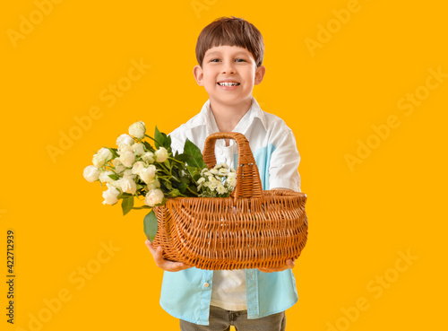 Cute little boy with bouque...