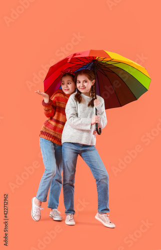 Portrait of cute twin girls...