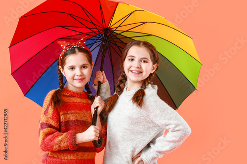 Portrait of cute twin girls...